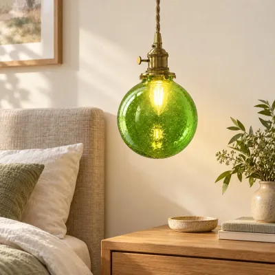 Suspension en verre c&ocirc;tel&eacute; vert