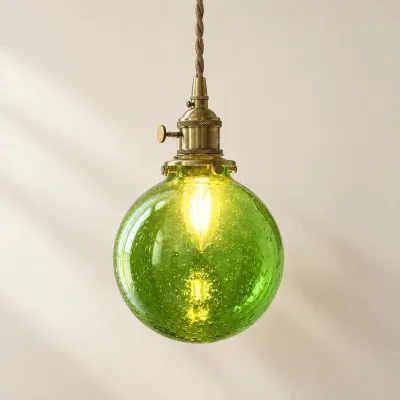 Suspension en verre c&ocirc;tel&eacute; vert