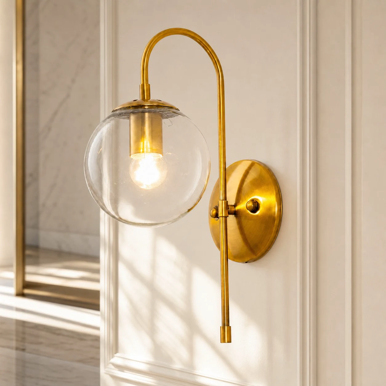 Luma Globe Wall Sconce &middot; Clear Glass &middot; Gold