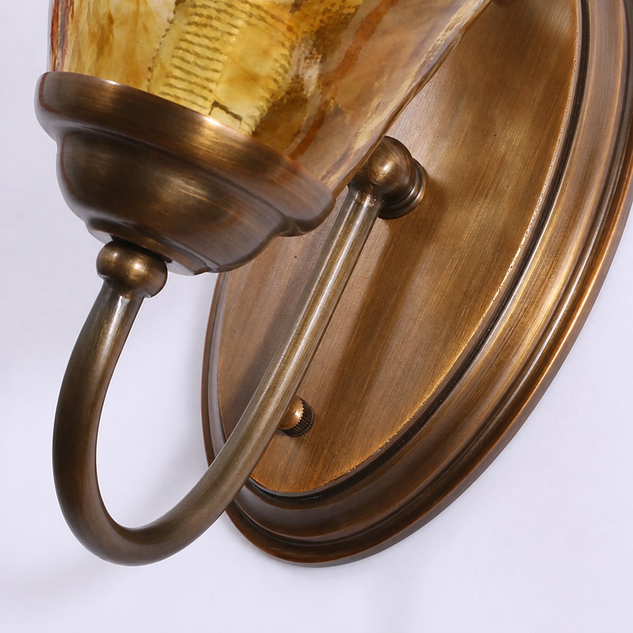 Sculpted Amber Glass and Brass Wall Sconce