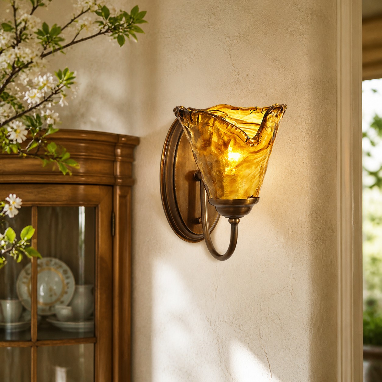 Sculpted Amber Glass and Brass Wall Sconce