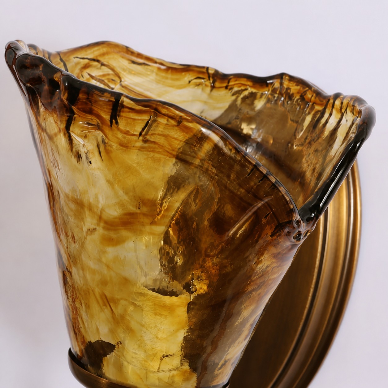 Sculpted Amber Glass and Brass Wall Sconce
