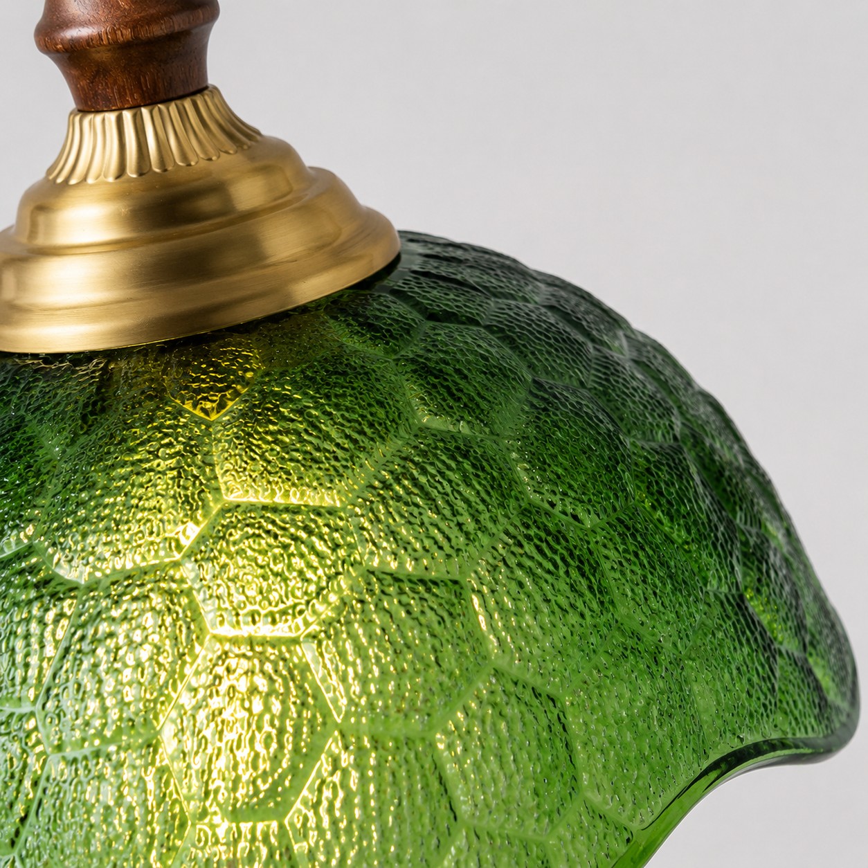 Green scalloped glass close-up